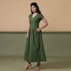 Left View of a Model wearing Reversible Forest Green Tie-Dye Cotton Maxi Wrap Dress