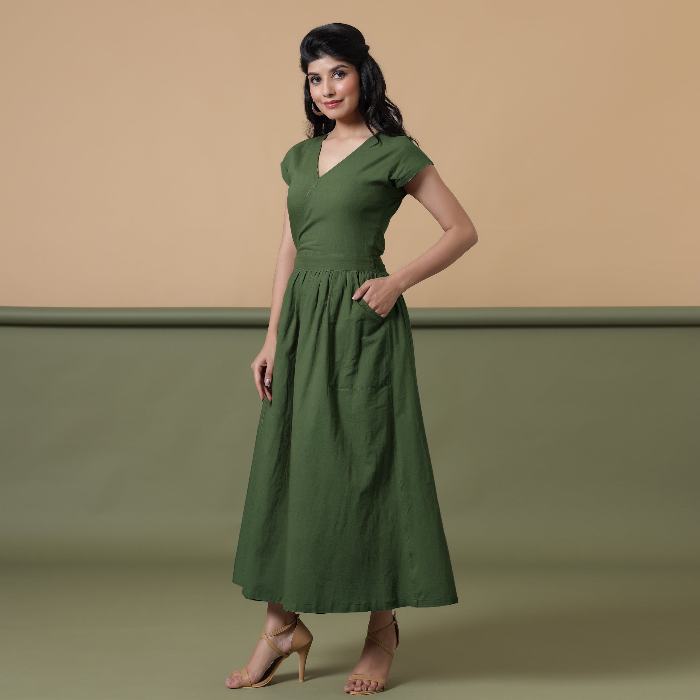 Left View of a Model wearing Reversible Forest Green Tie-Dye Cotton Maxi Wrap Dress