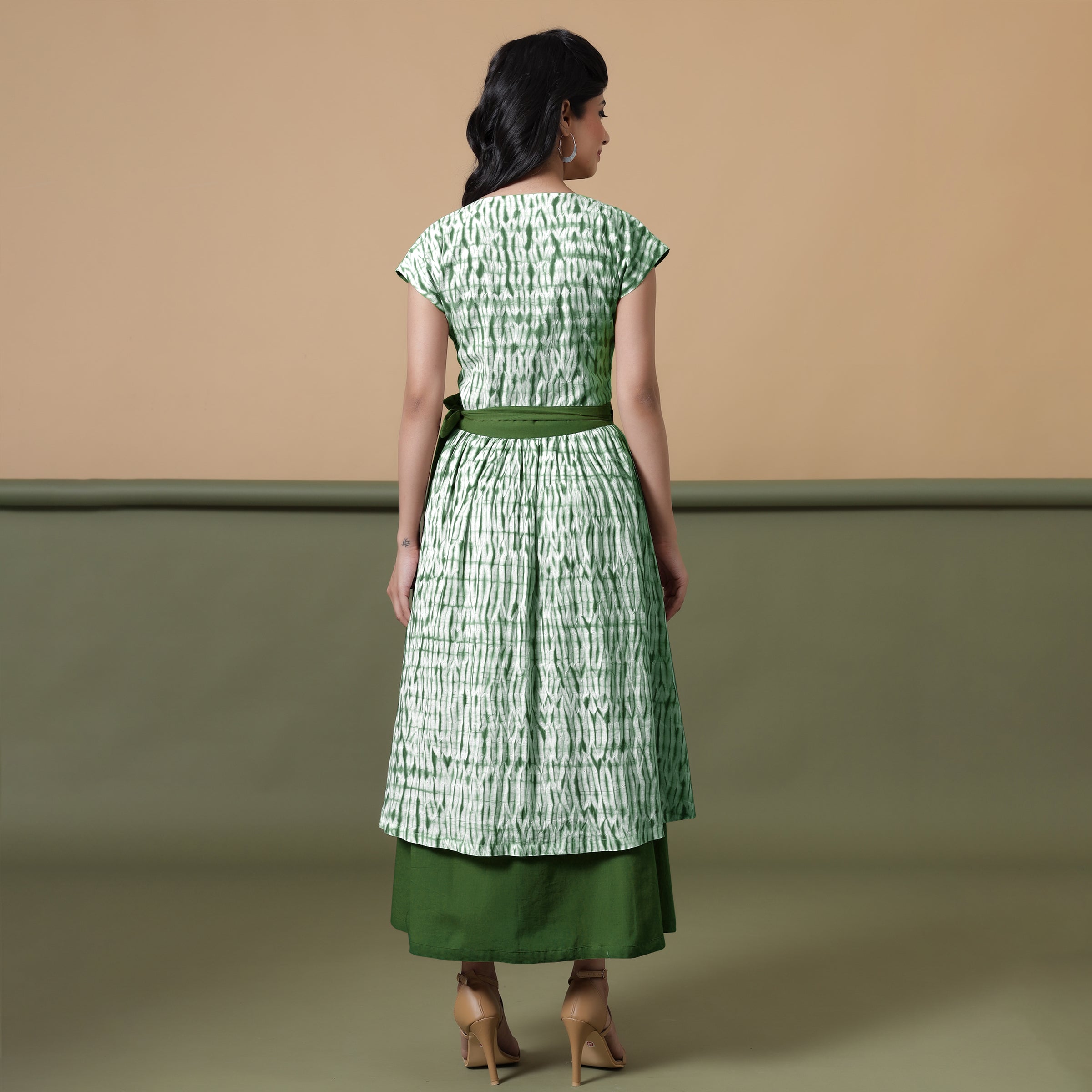 Back View of a Model wearing Reversible Forest Green Tie-Dye Cotton Maxi Wrap Dress