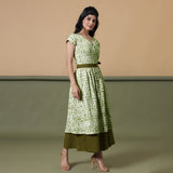 Right View of a Model wearing Reversible Moss Green Tie-Dye Cotton Maxi Wrap Dress