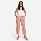 Front View of a Model wearing Rust Ditsy Block Printed Lace Cotton Straight Pant