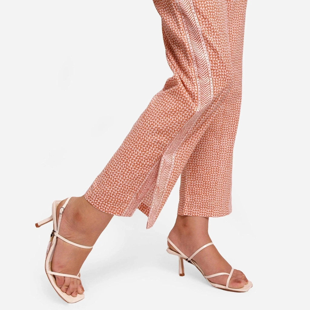 Close View of a Model wearing Rust Ditsy Block Printed Lace Cotton Straight Pant