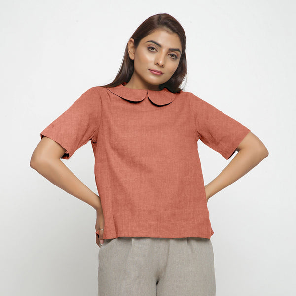 Front View of a Model wearing Rust Sandstone 100% Linen Peter Pan Collar Top