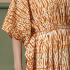 Close View of a Model wearing Rust Sandstone Shibori Tie-Dye Cotton Midi Kaftan Dress