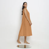 Right View of a Model wearing Rust Vegetable Dyed A-Line Paneled Dress