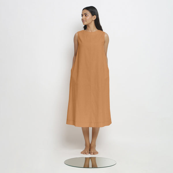 Front View of a Model wearing Rust Vegetable Dyed A-Line Paneled Dress