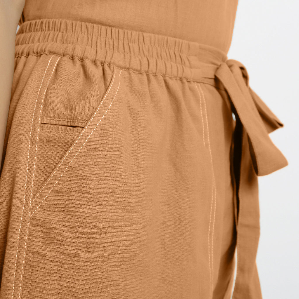 Front Detail of a Model wearing Rust Vegetable Dyed Handspun Short Shorts