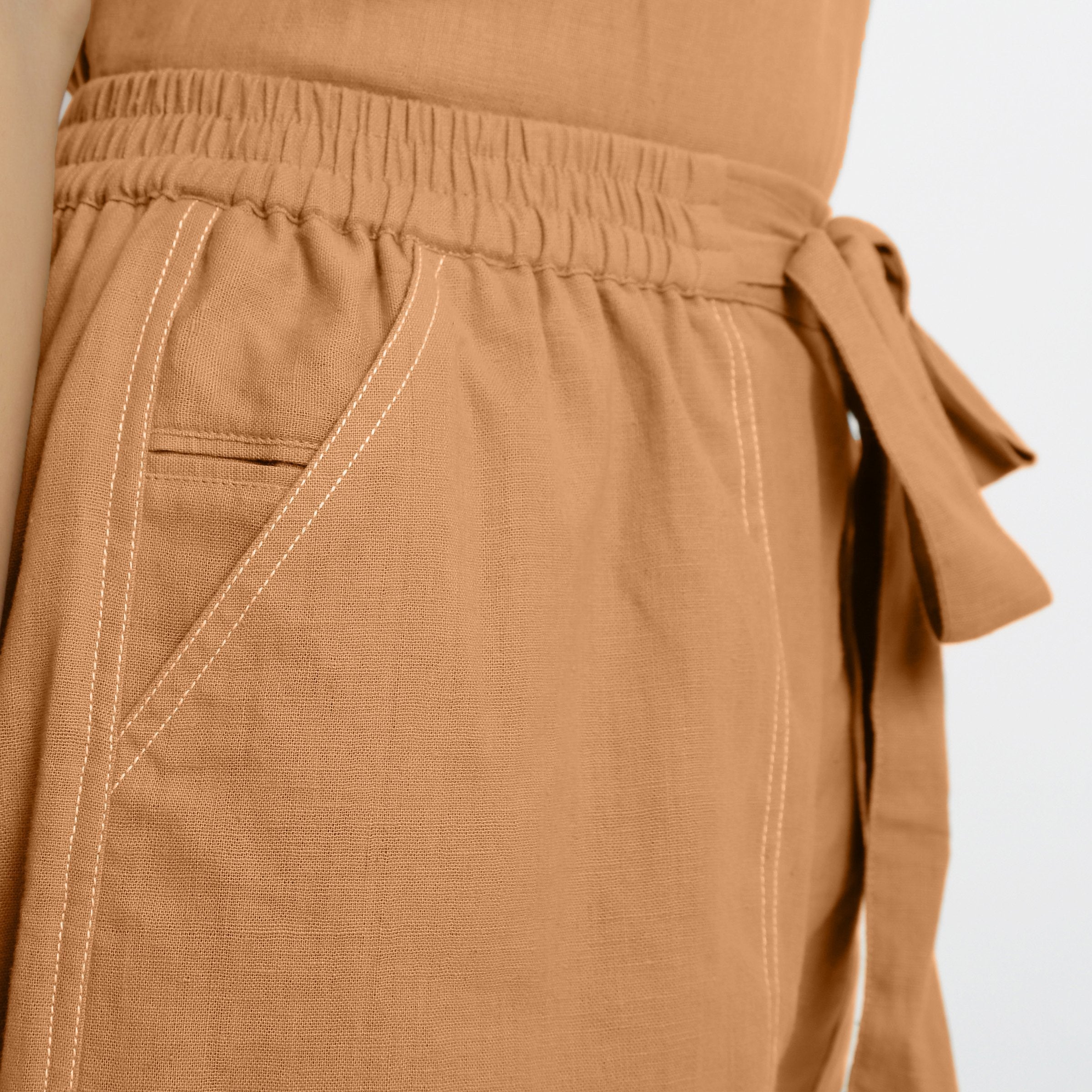 Front Detail of a Model wearing Rust Vegetable Dyed Handspun Short Shorts