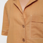 Front Detail of a Model wearing Rust Vegetable Dyed Solid Handspun Shirt