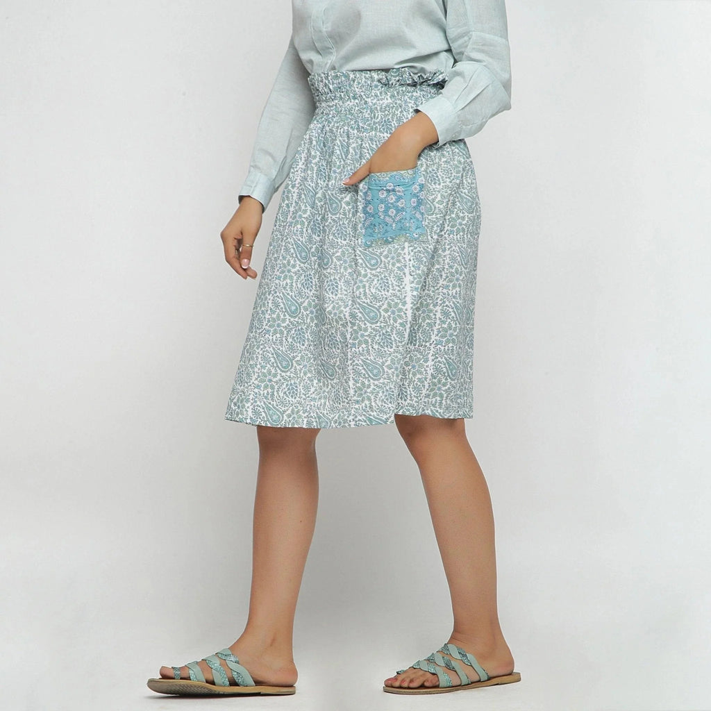 Left View of a Model wearing Sage Green Block Printed Cotton Knee Length Skirt