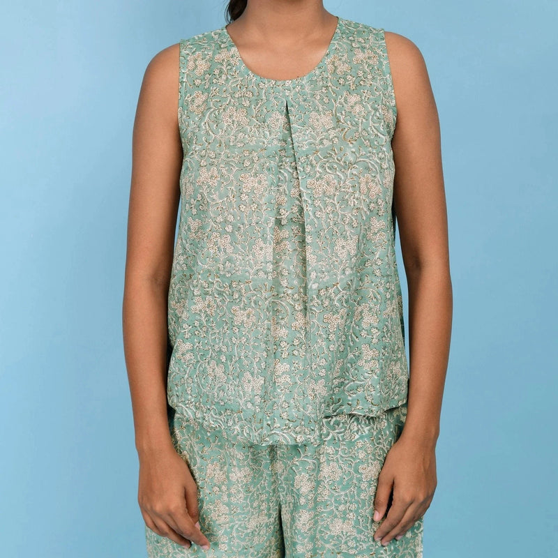 Front Detail of a Model wearing Sage Green Block Printed Pleated Cotton Top