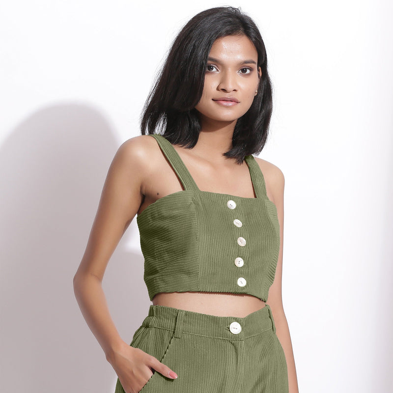 Right View of a Model wearing Sage Green Cotton Corduroy Crop Top