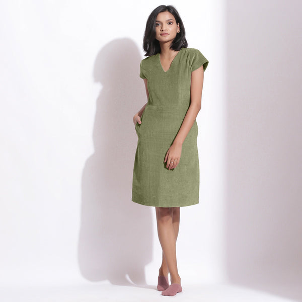 Front View of a Model wearing Sage Green Cotton Corduroy V-Neck Dress