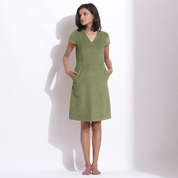 Front View of a Model wearing Sage Green Cotton Corduroy V-Neck Dress