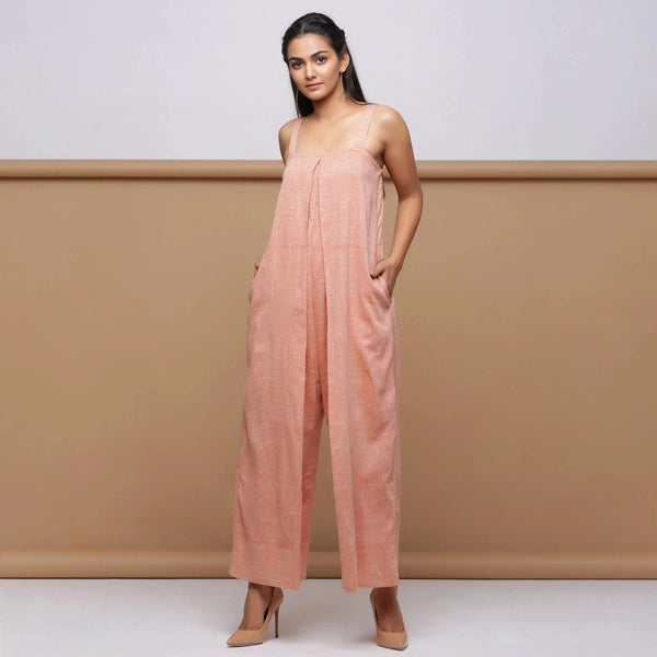 Front View of Model wearing Salmon Pink Handspun Pleated Jumpsuit