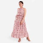 Left View of a Model wearing Peach Tiered Cotton Halter Neck Dress