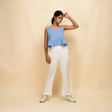 Front View of a Model wearing Sky Blue Handwoven 100% Cotton Peplum Top