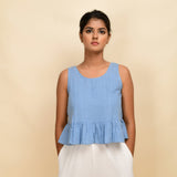 Front View of a Model wearing Sky Blue Handwoven 100% Cotton Peplum Top