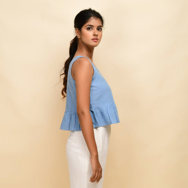 Right View of a Model wearing Sky Blue Handwoven 100% Cotton Peplum Top