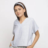 Front View of a Model wearing V-Neck Handspun Cotton Straight-Fit Top