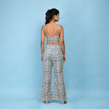 Back View of a Model wearing Slate Blue Block Printed Floral Cotton Bustier Top