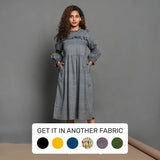 Front View of a Model wearing Slate Grey Handspun Cotton Knee Length Frilled Peasant Dress