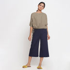 Front View of a Model wearing Solid Beige Cotton Flax Blouson Top