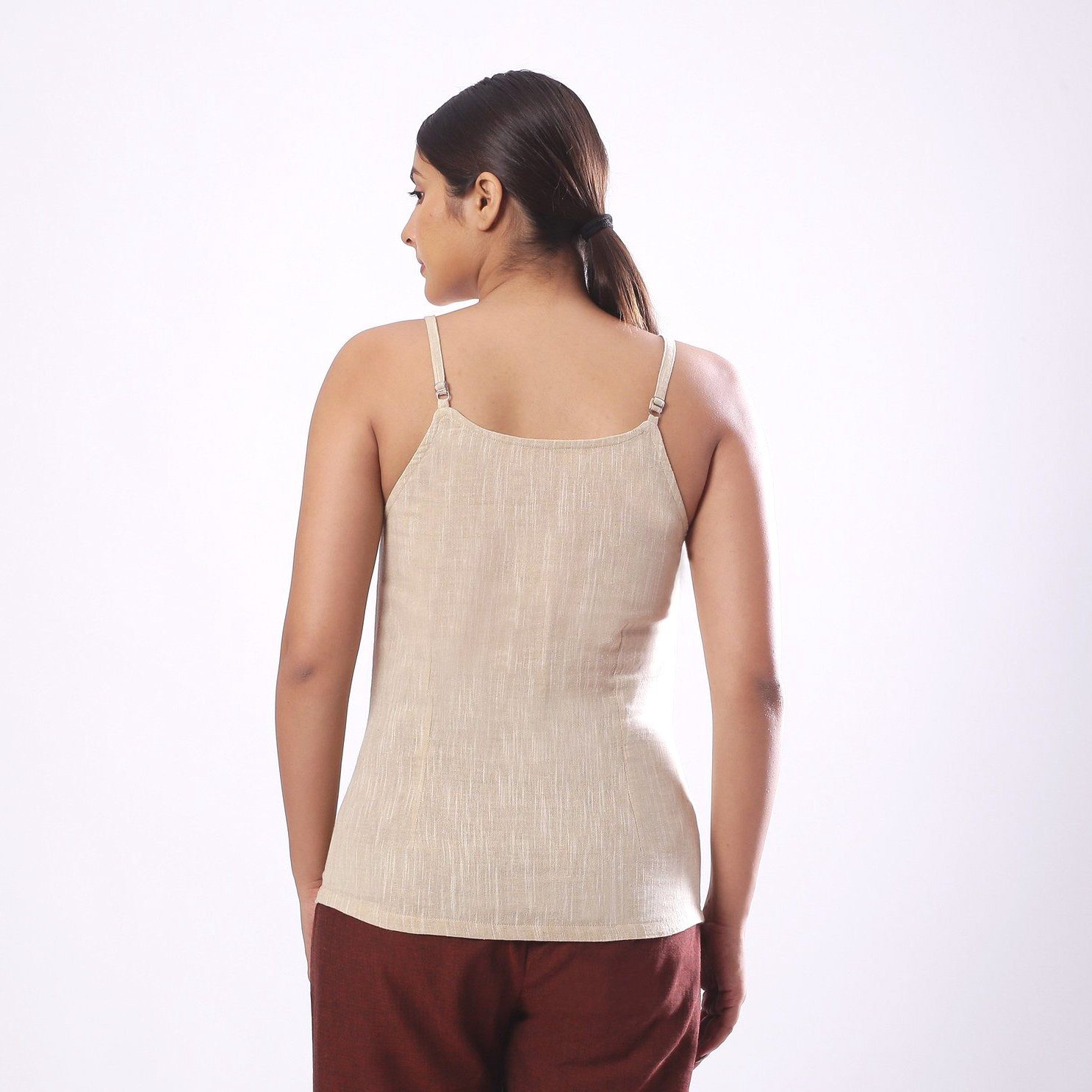 Back View of a Model wearing Solid Beige Cotton Flax Spaghetti Top