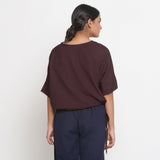 Back View of a Model wearing Solid Brown Cotton Flax Blouson Top
