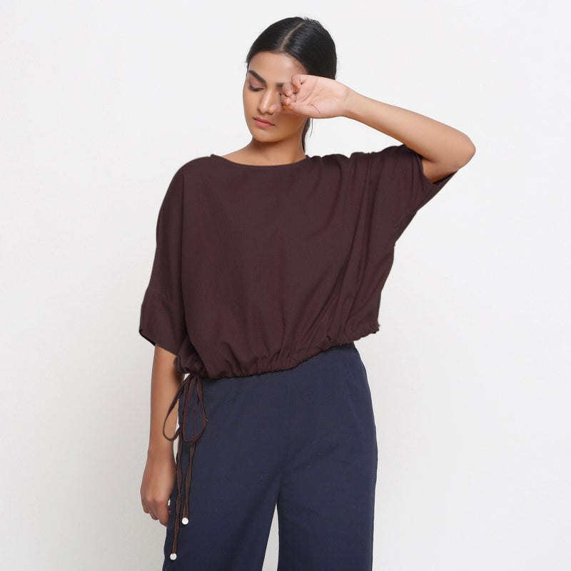 Front View of a Model wearing Solid Brown Cotton Flax Blouson Top