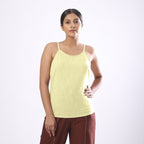 Front View of a Model wearing Solid Lemon Yellow Basic Cotton Spaghetti Top