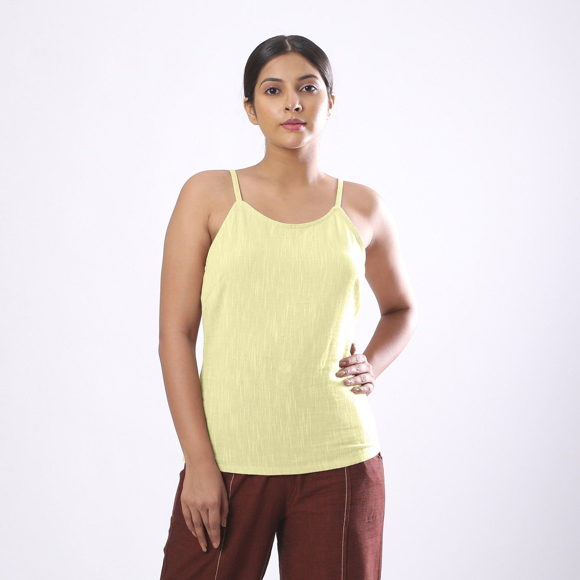 Front View of a Model wearing Solid Lemon Yellow Basic Cotton Spaghetti Top
