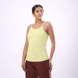 Front View of a Model wearing Solid Lemon Yellow Basic Cotton Spaghetti Top