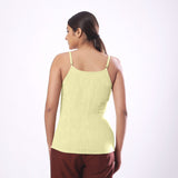 Back View of a Model wearing Solid Lemon Yellow Basic Cotton Spaghetti Top