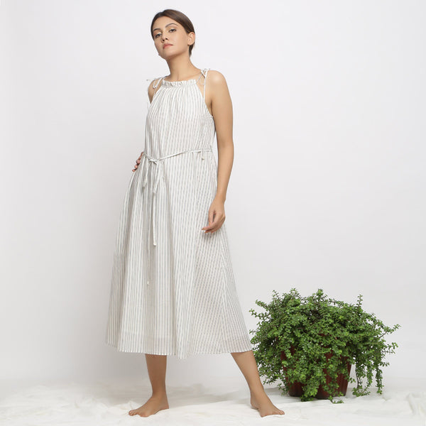 Front View of a Model wearing Strappy Handspun Flared Maxi Dress