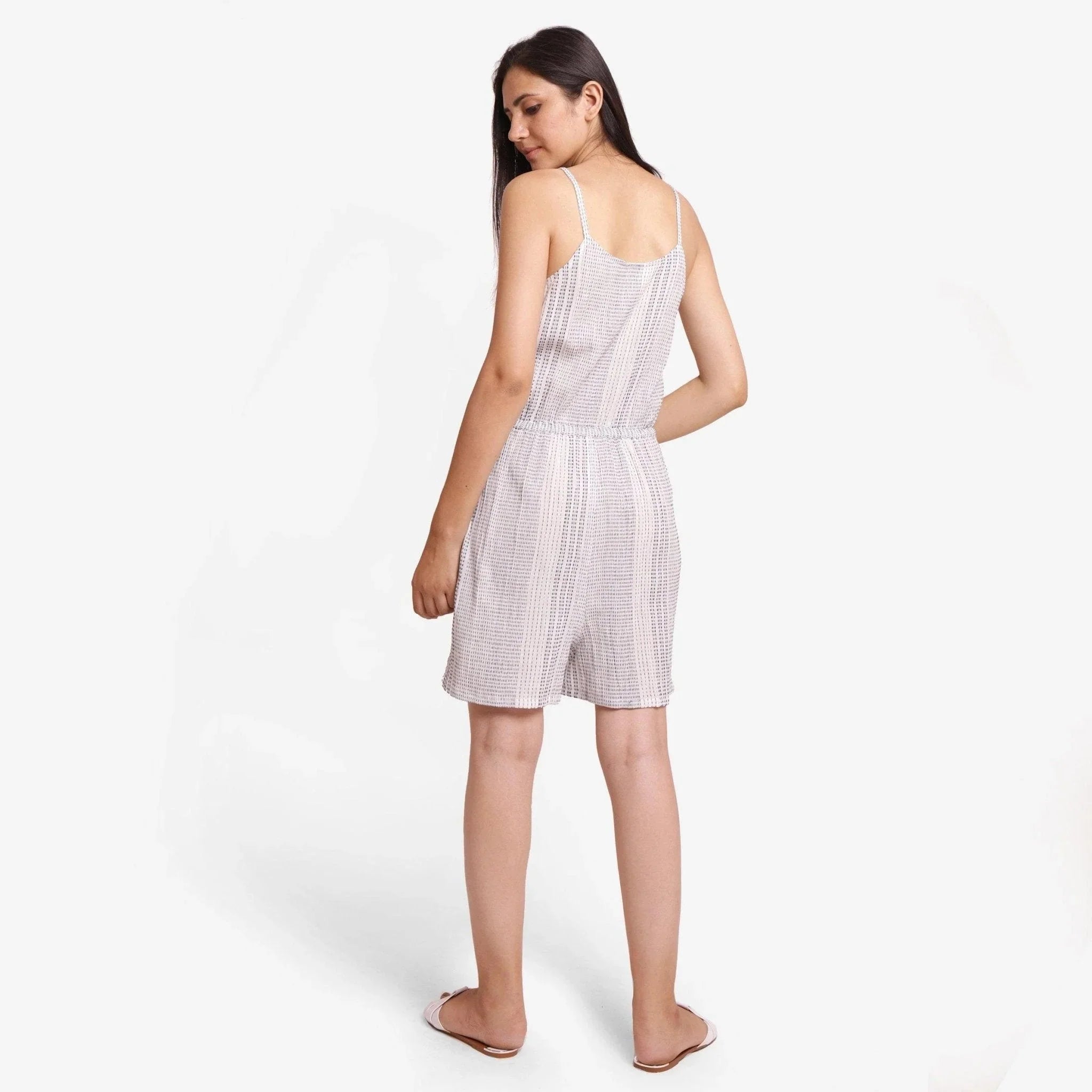 Back View of a Model wearing Strappy White 100% Cotton Short Striped Playsuit