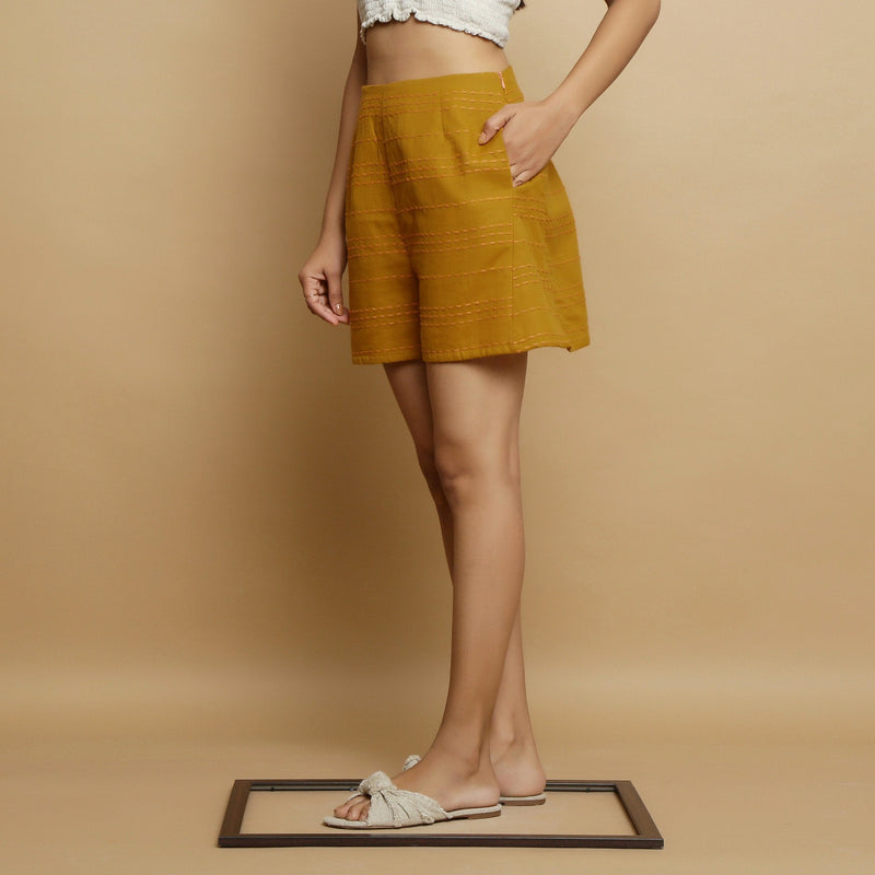 Left View of a Model wearing Striped Handwoven Flared Godet Shorts