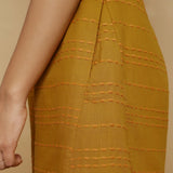 Left Detail of a Model wearing Striped Handwoven Flared Godet Shorts