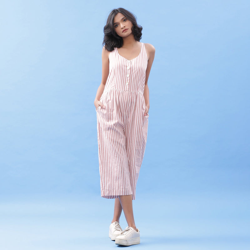 Front View of a Model wearing Striped Pink Cotton Button-Down Jumpsuit