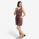 Left View of a Model wearing Striped Block Print Cotton Sleeveless Short Romper