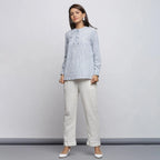 Front View of a Model wearing Striped Yarn Dyed Cotton Tie Neck Cuff Sleeve Top