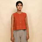 Front View of a Model wearing Sunset Rust Warm Cotton Corduroy Button-Down Short Top