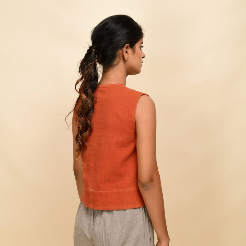 Back View of a Model wearing Sunset Rust Warm Cotton Corduroy Button-Down Short Top