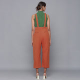 Back View of a Model wearing Sunset Rust Cotton Corduroy Dungaree
