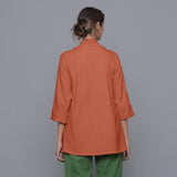 Back View of a Model wearing Sunset Rust Corduroy Front Open Overlay