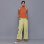 Front View of a Model wearing Sunset Rust Cotton Corduroy High Neck Top