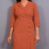 Front Detail of a Model wearing Sunset Rust Warm Cotton Corduroy Front Slit Maxi Dress