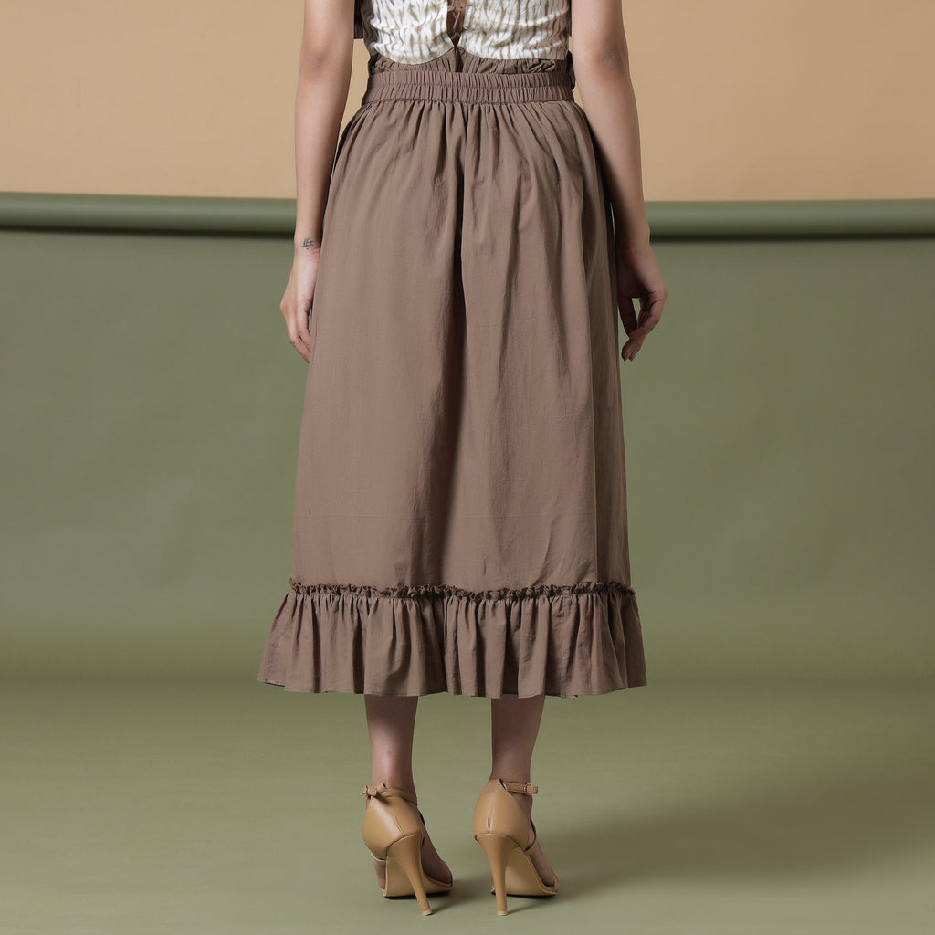 Back View of a Model wearing Taupe Cotton Mid-Rise Ruffled Elasticated Midi Skirt