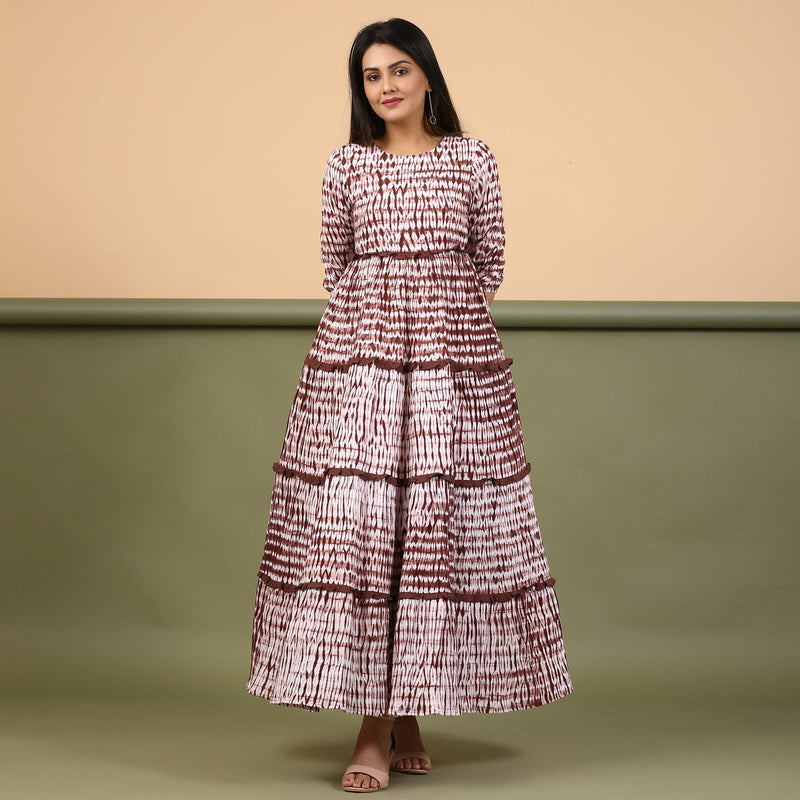 Front View of a Model wearing Taupe Shibori Tie-Dye Cotton Ankle Length Tier Bohemian Dress