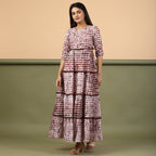 Front View of a Model wearing Taupe Shibori Tie-Dye Cotton Ankle Length Tier Bohemian Dress